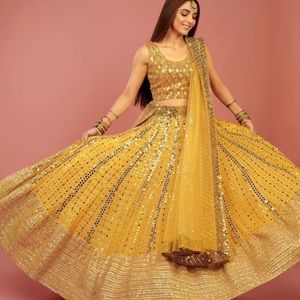 Yellow lehenga with short sleeve blouse and dupatta